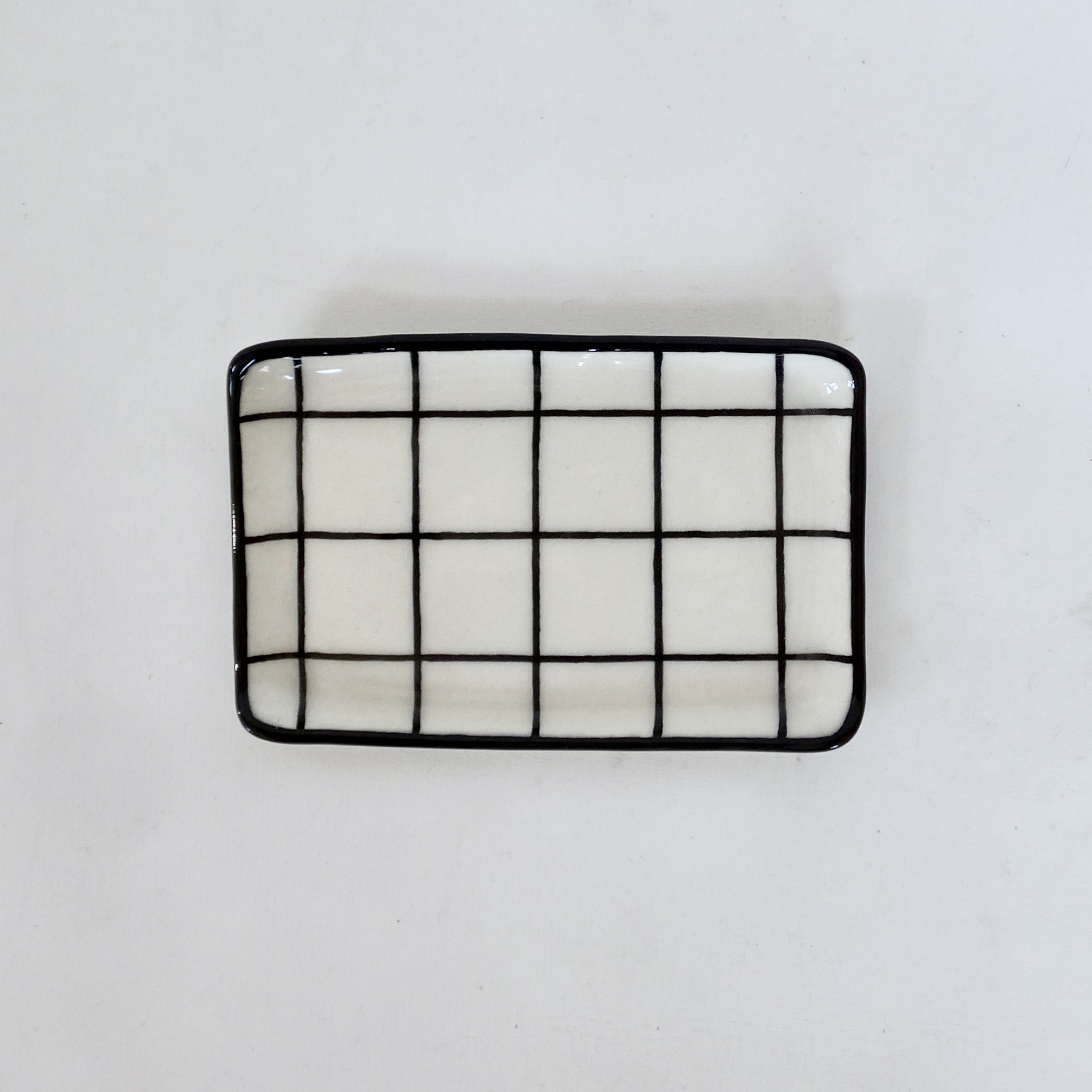 Sous-tasse à carreaux Sous-tasse à carreaux