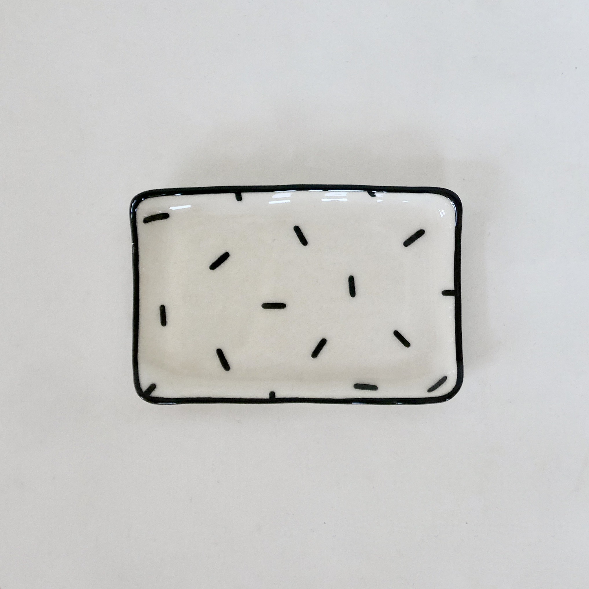 Sous-tasse blanche confetti Sous-tasse blanche confetti